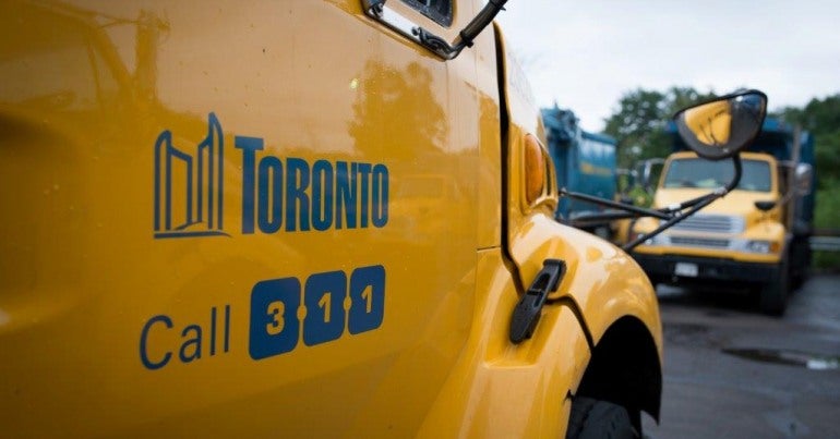 Toronto solid waste removal truck