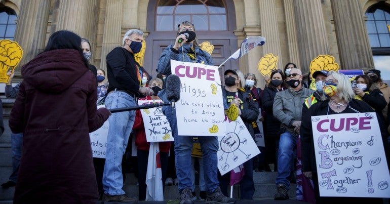Patricia Brewer, President of CUPE 1840, speaking at a rally